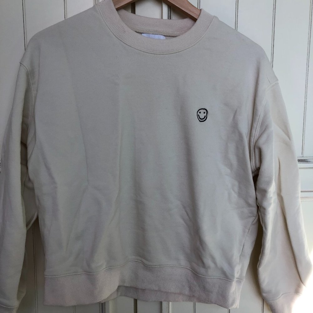 Things Between smiley face sweatshirt